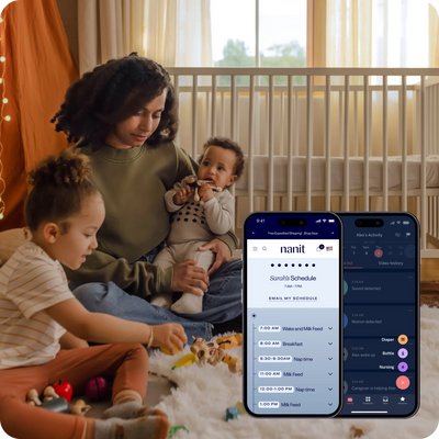 woman playing with kids and nanit app in foreground with mobile showing the nanit app