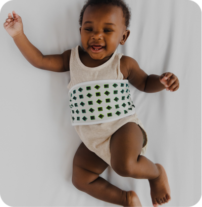 child wearing nanit breathing band